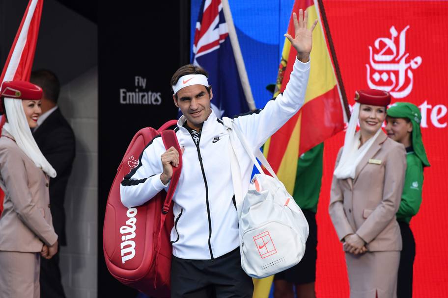 L’ingresso in campo di Federer... EPA